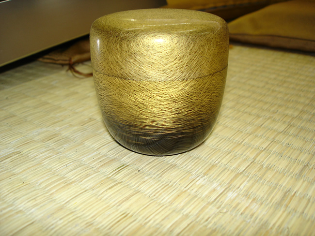 Cup with pine needles